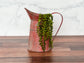 Red Metal Pitcher